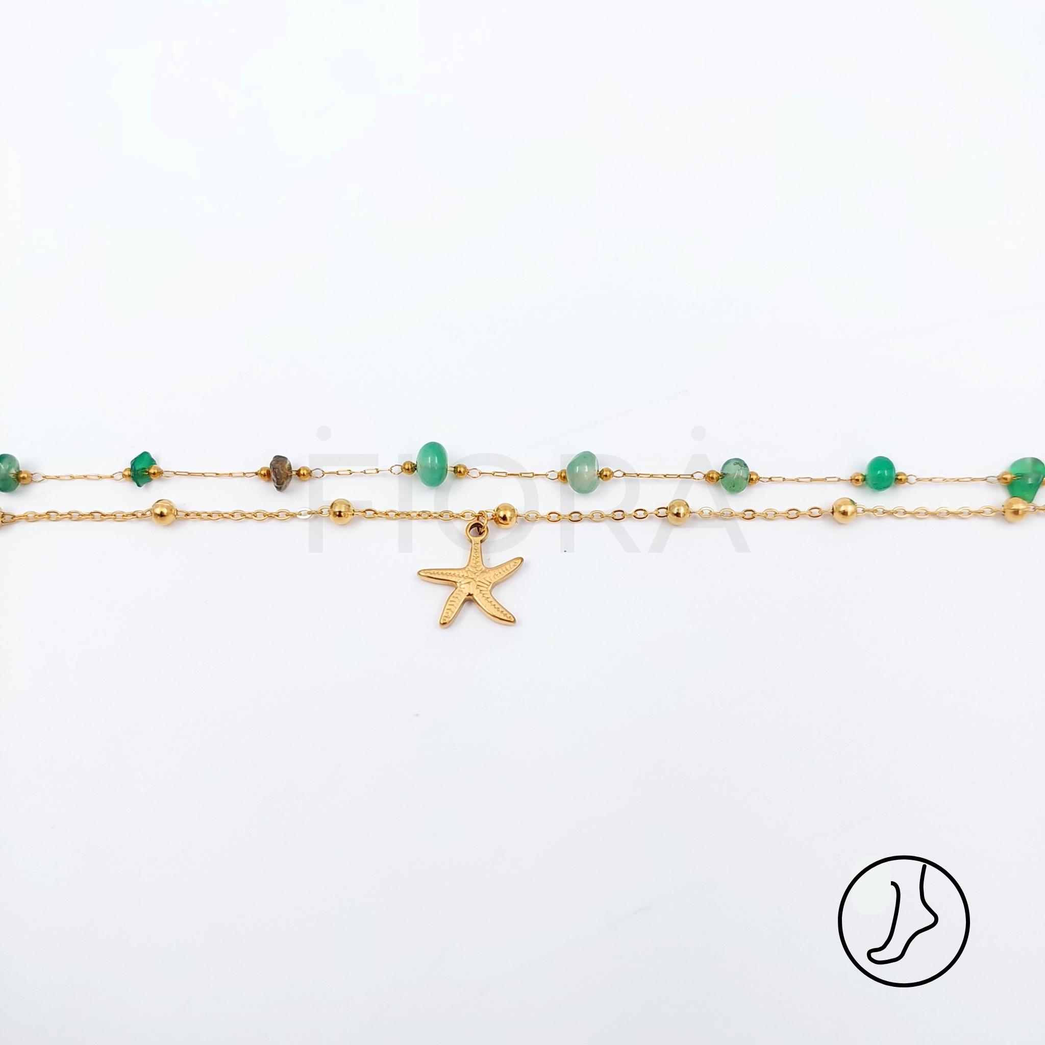 Starfish charm anklet with green beads and gold chain.