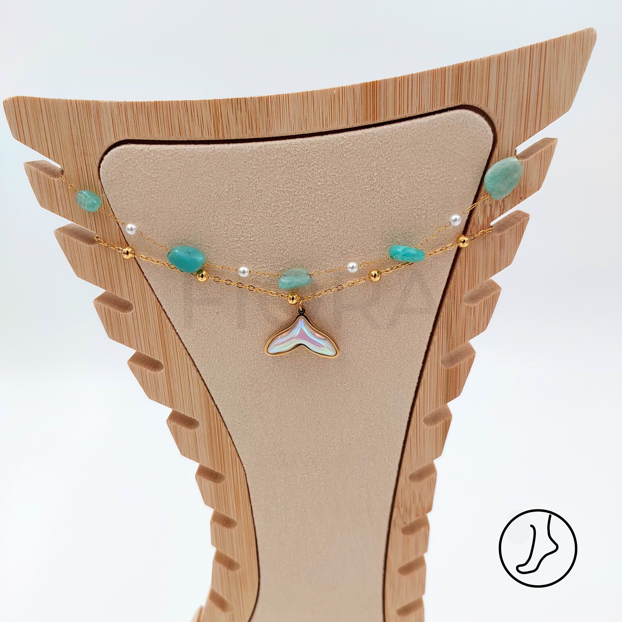 Women’s anklet with turquoise beads and gold enamel whale tail.