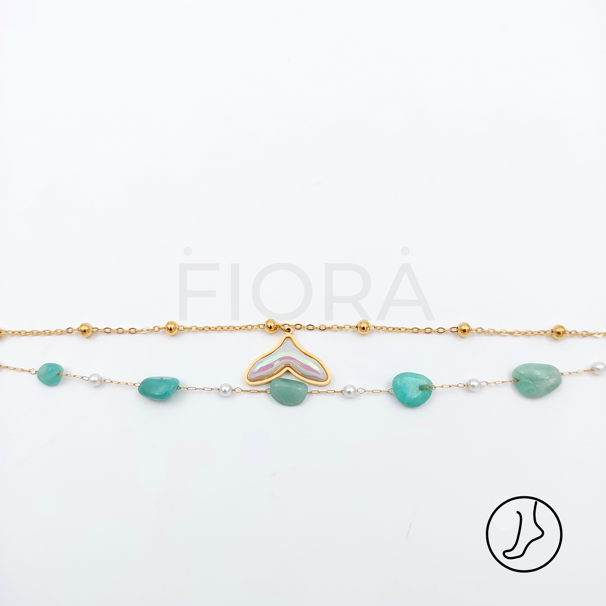 Women’s anklet with turquoise beads and gold enamel whale tail.
