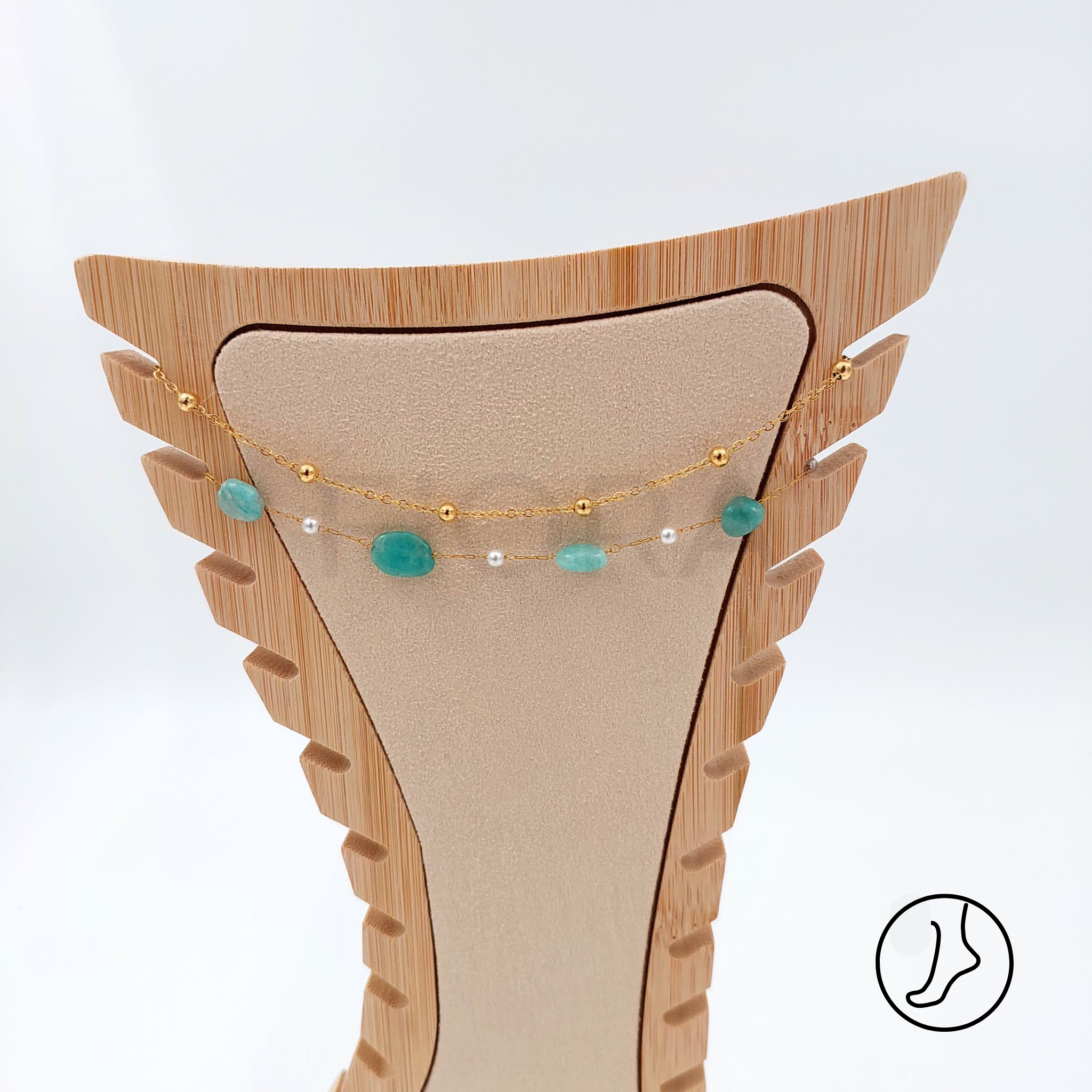 Gold-plated anklet with white pearls and turquoise accents for women.