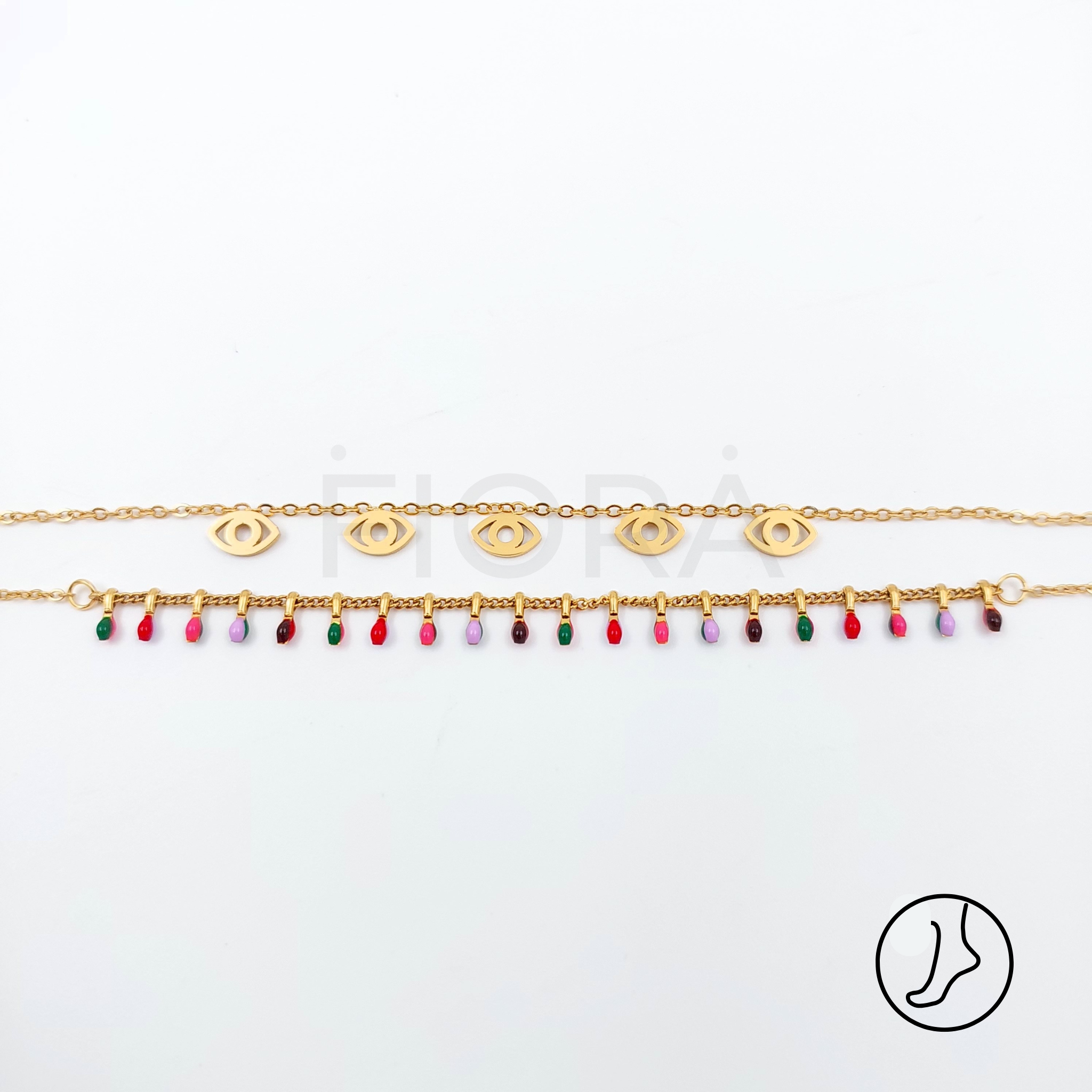 Double-chain gold anklet with eye charms and beads.