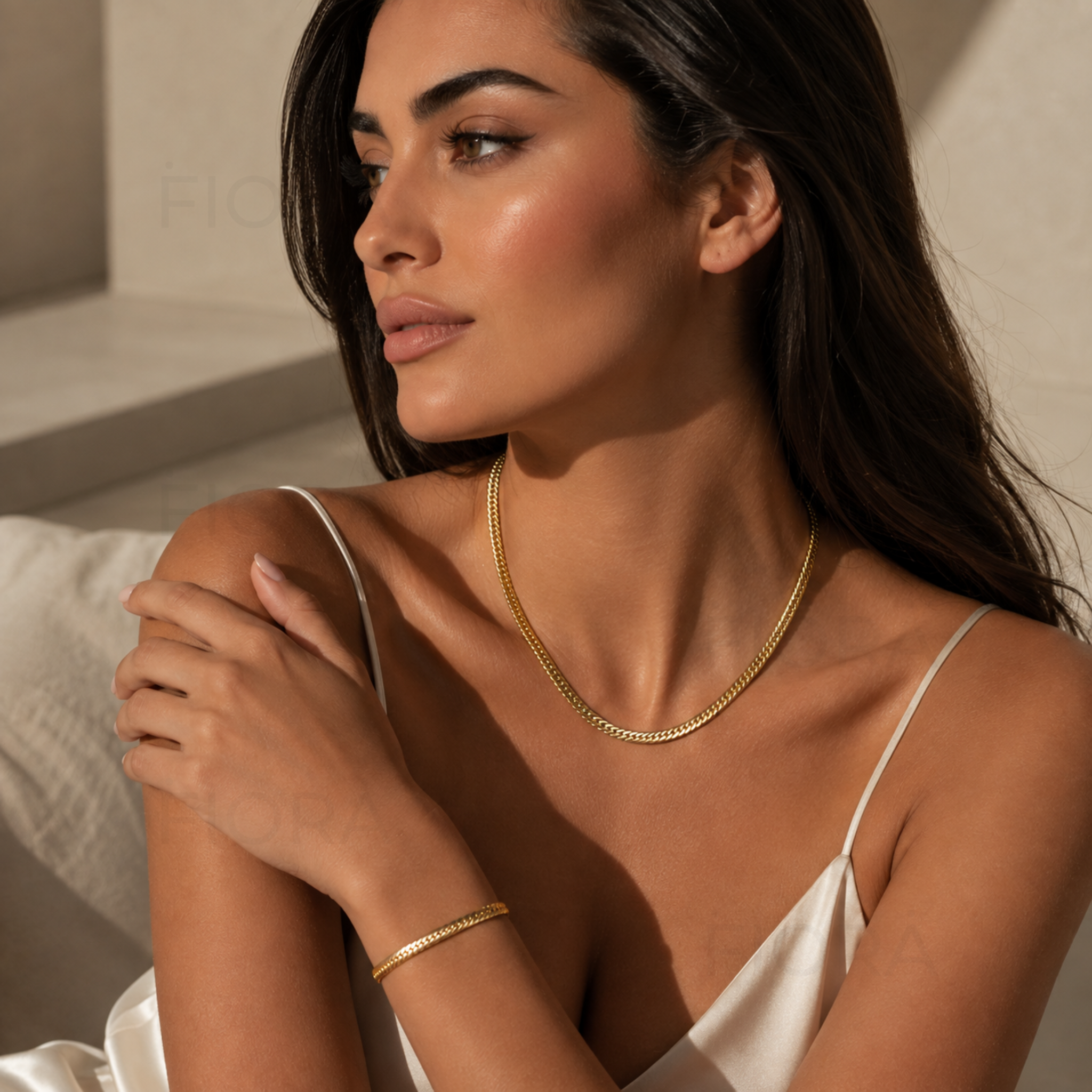 Vista Signature gold necklace and bracelet matching jewelry set with polished flat chain design on a white background.