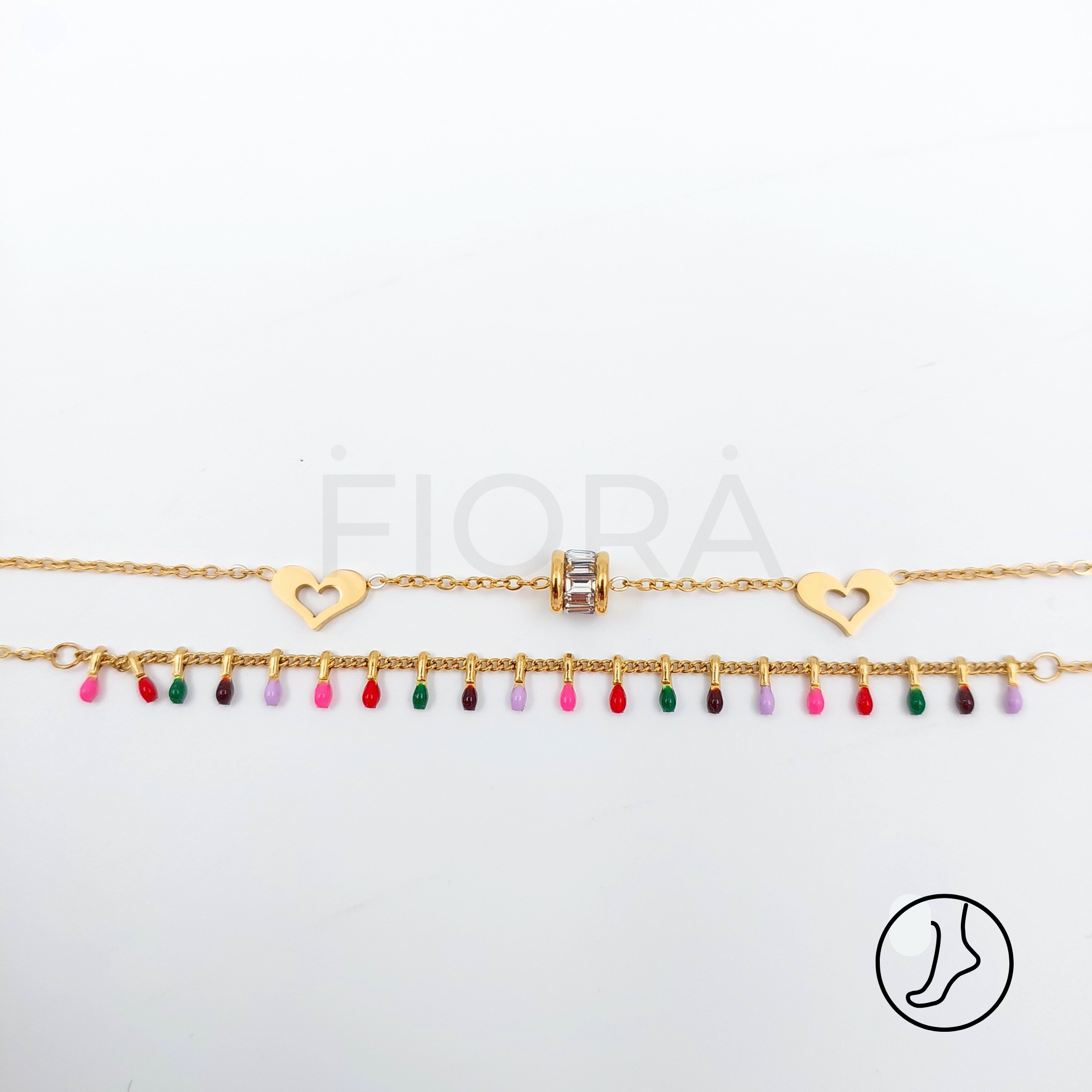 Double gold-plated anklet with hearts and colorful beads.