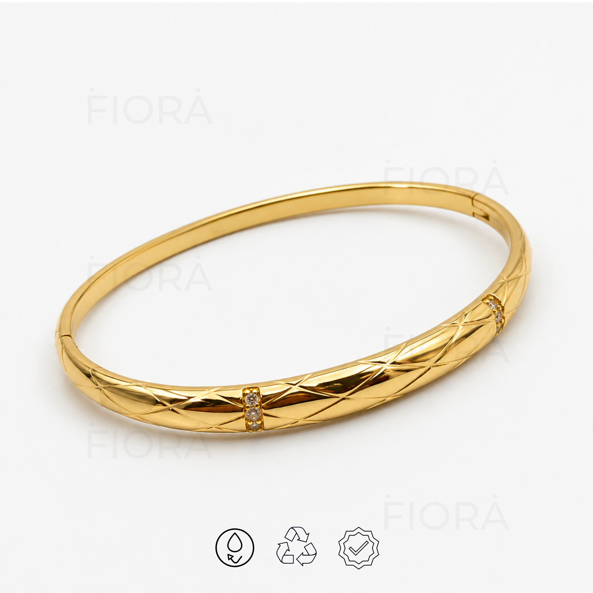 Luxury gold quilted bangle with elegant engraved pattern viewed from the opposite angle.