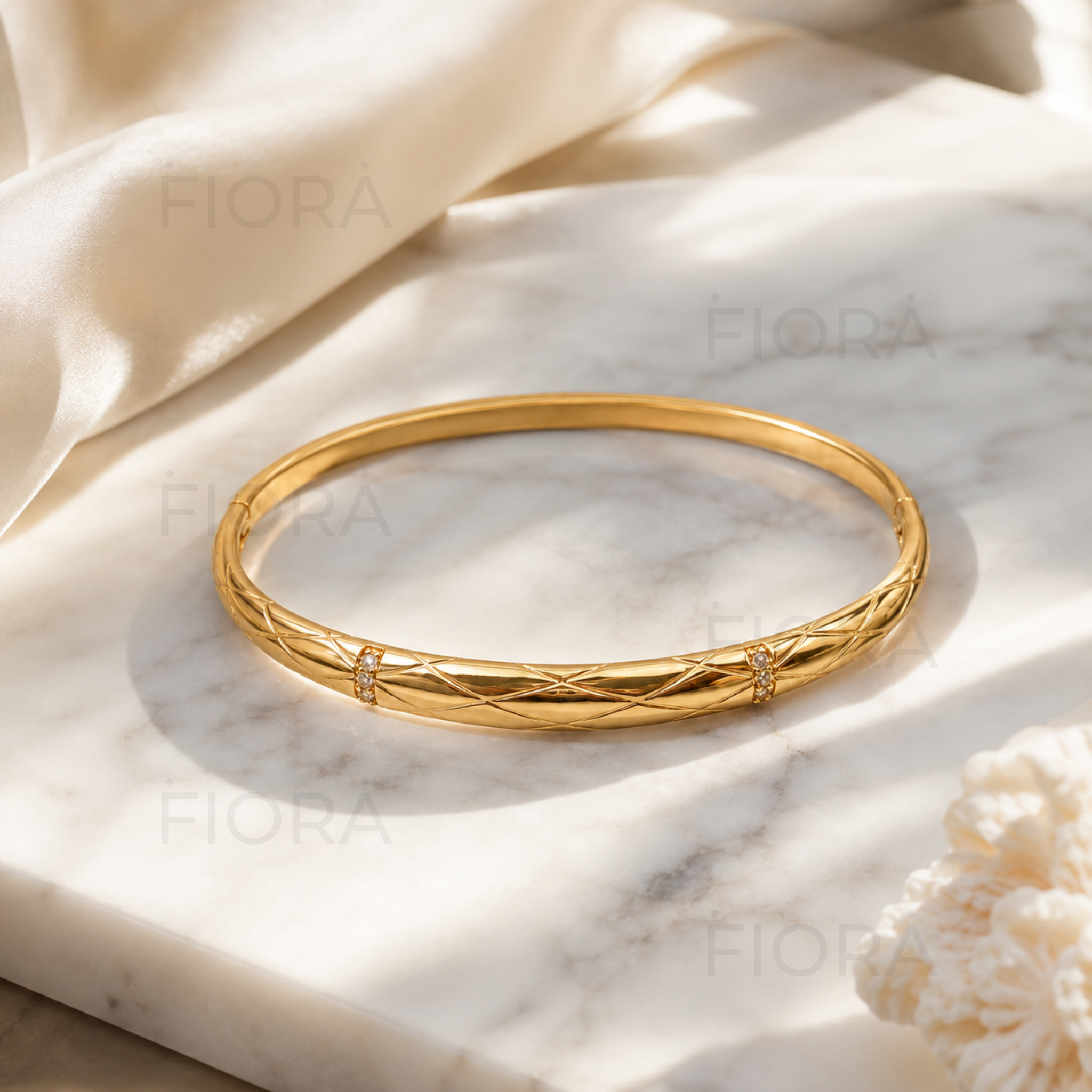 Liora quilted gold bangle with crystal accents