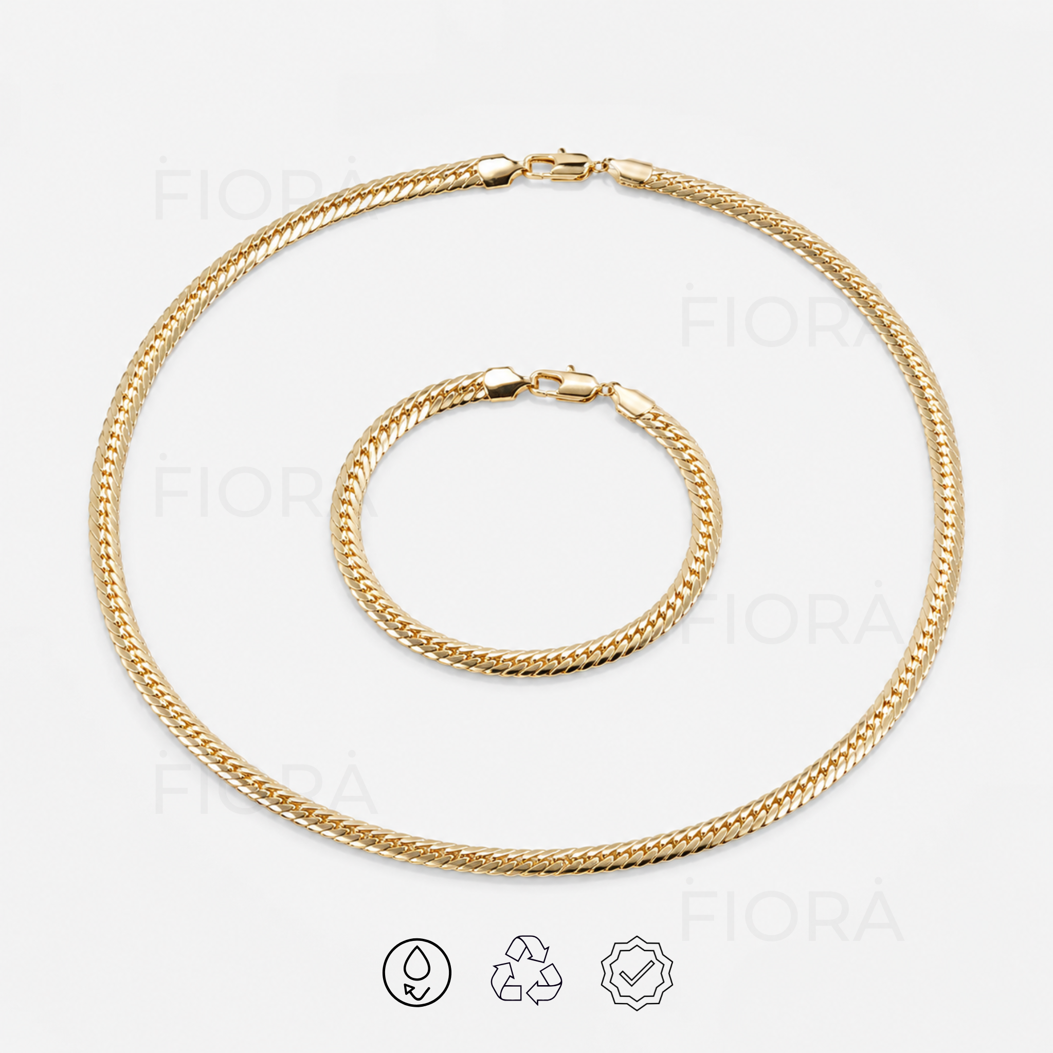 Vista Signature gold necklace and bracelet matching jewelry set with polished flat chain design on a white background.